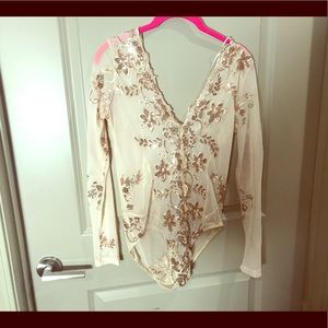 Cream sheer bodysuit with sequin embellishments